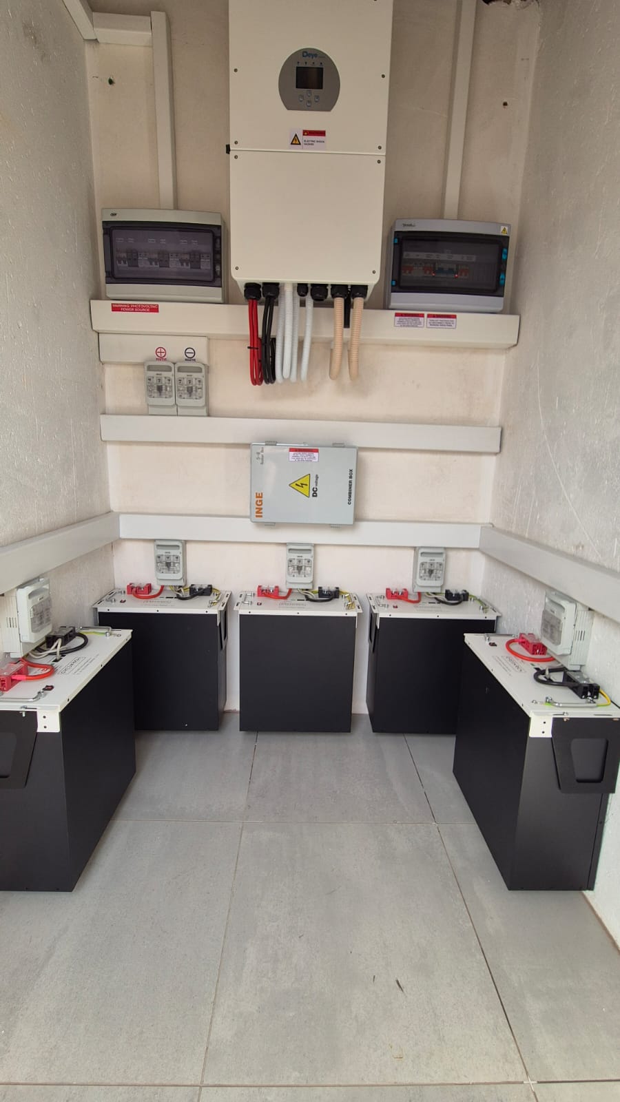 Off-grid solar and battery system supporting a coffee shop operation